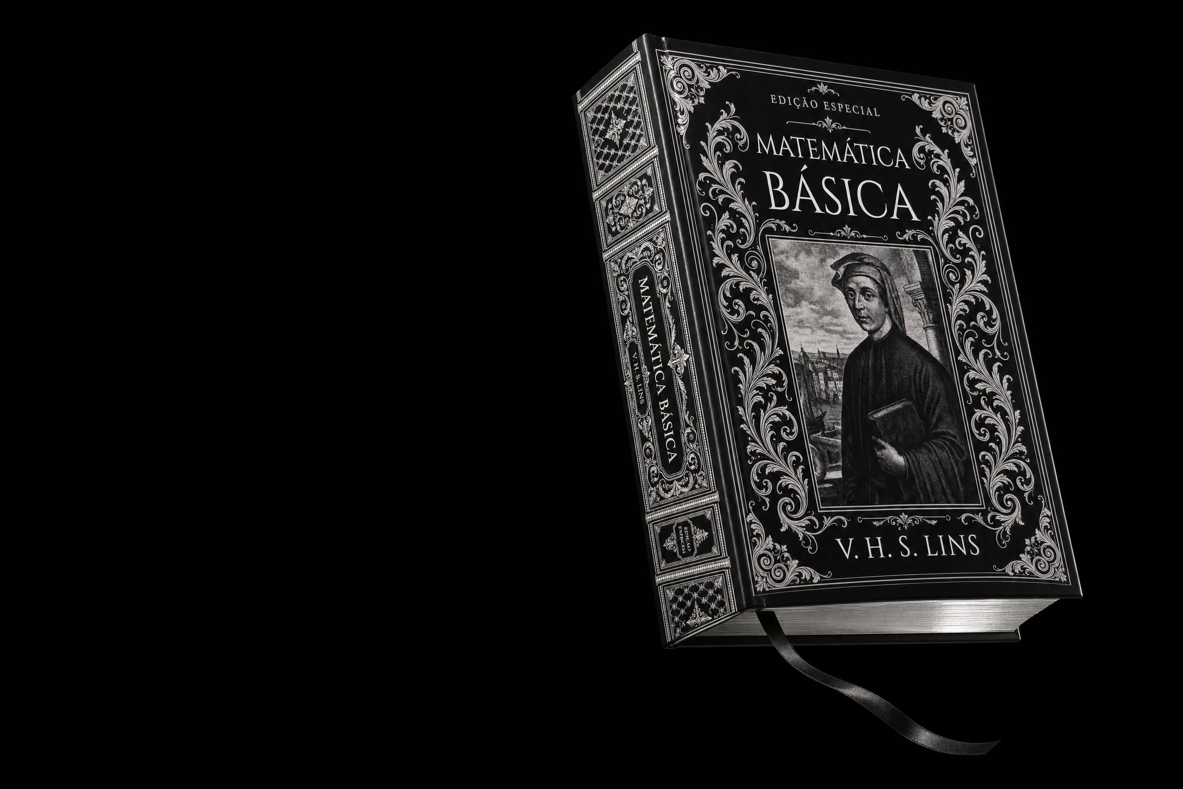 Exemplar do Lote 03 da Edição Especial de Matemática Básica: capa dura preta com ornamento prateado, corte do miolo pintado a prata cromada e fita marcadora de cetim preta