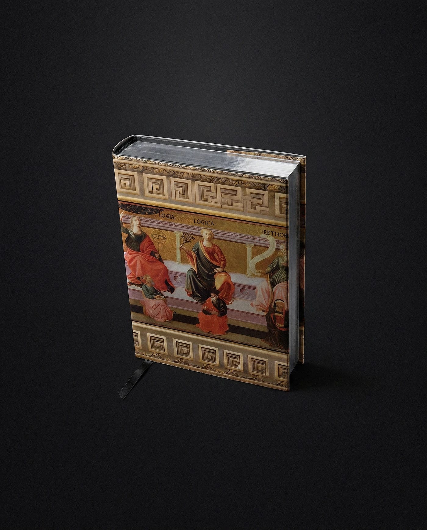 O exemplar do Lote 03 com a sobrecapa das Sete Artes Liberais: capa dura em laminação soft touch, corte do miolo em prata cromada e fita de cetim preta
